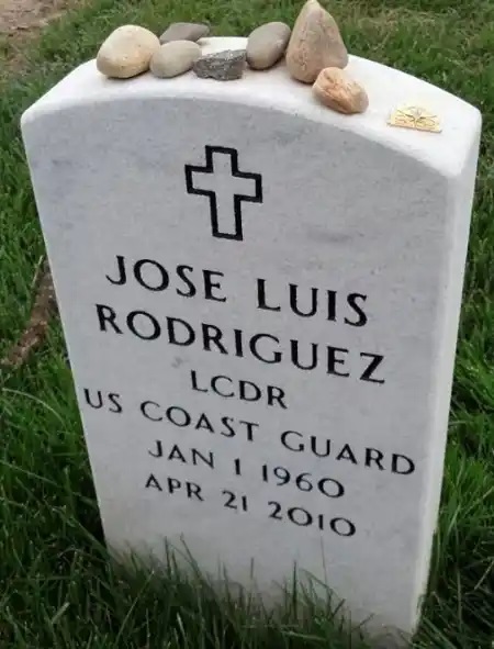 The headstone marking LCDR Rodriguez’s grave at Arlington National Cemetery. (Coast Guard Tactical Law Enforcement Association) The headstone marking LCDR Rodriguez’s grave at Arlington National Cemetery. (Coast Guard Tactical Law Enforcement Association)